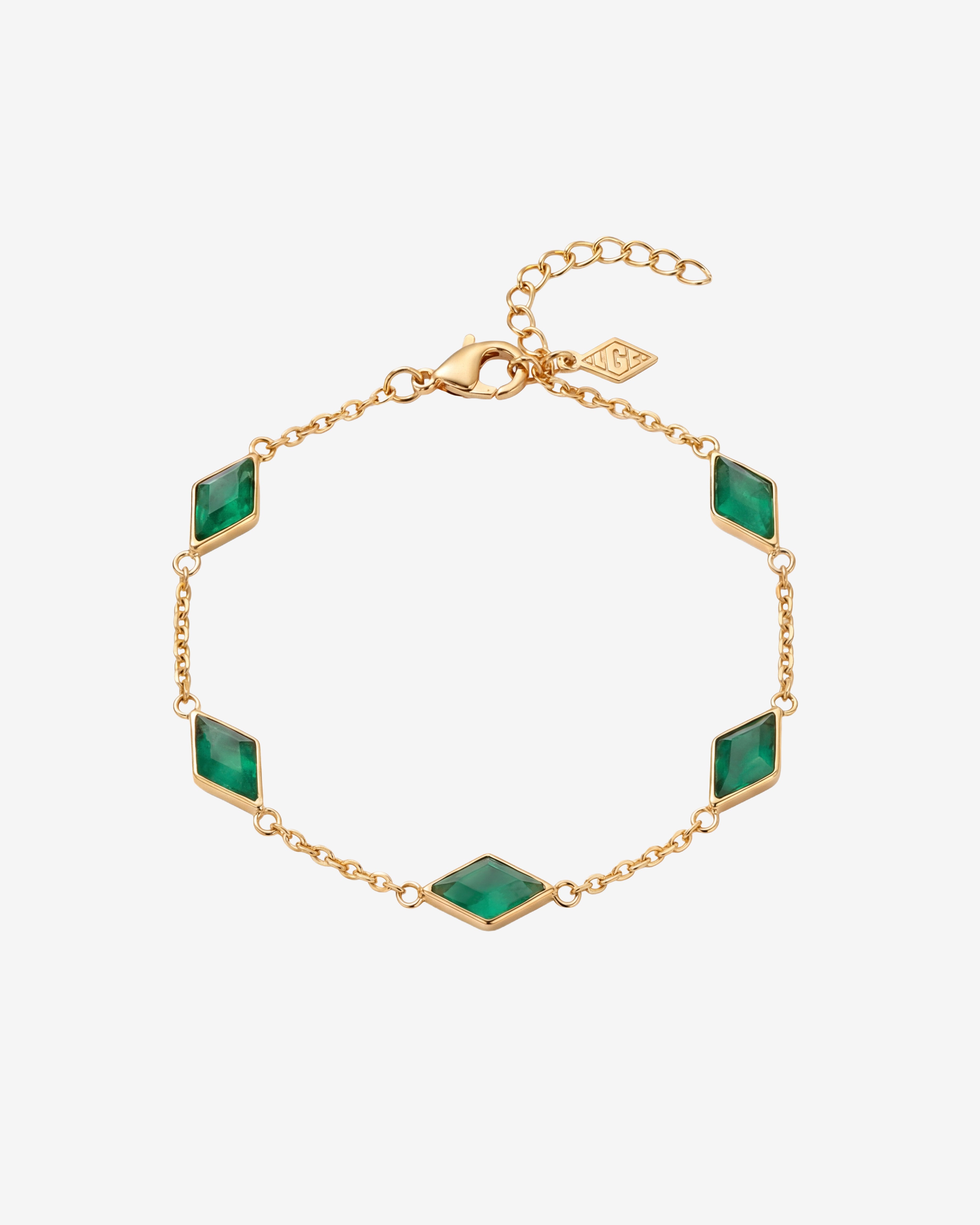 Amberes gold bracelet with emerald green diamond shaped stones in gold frames on an adjustable chain