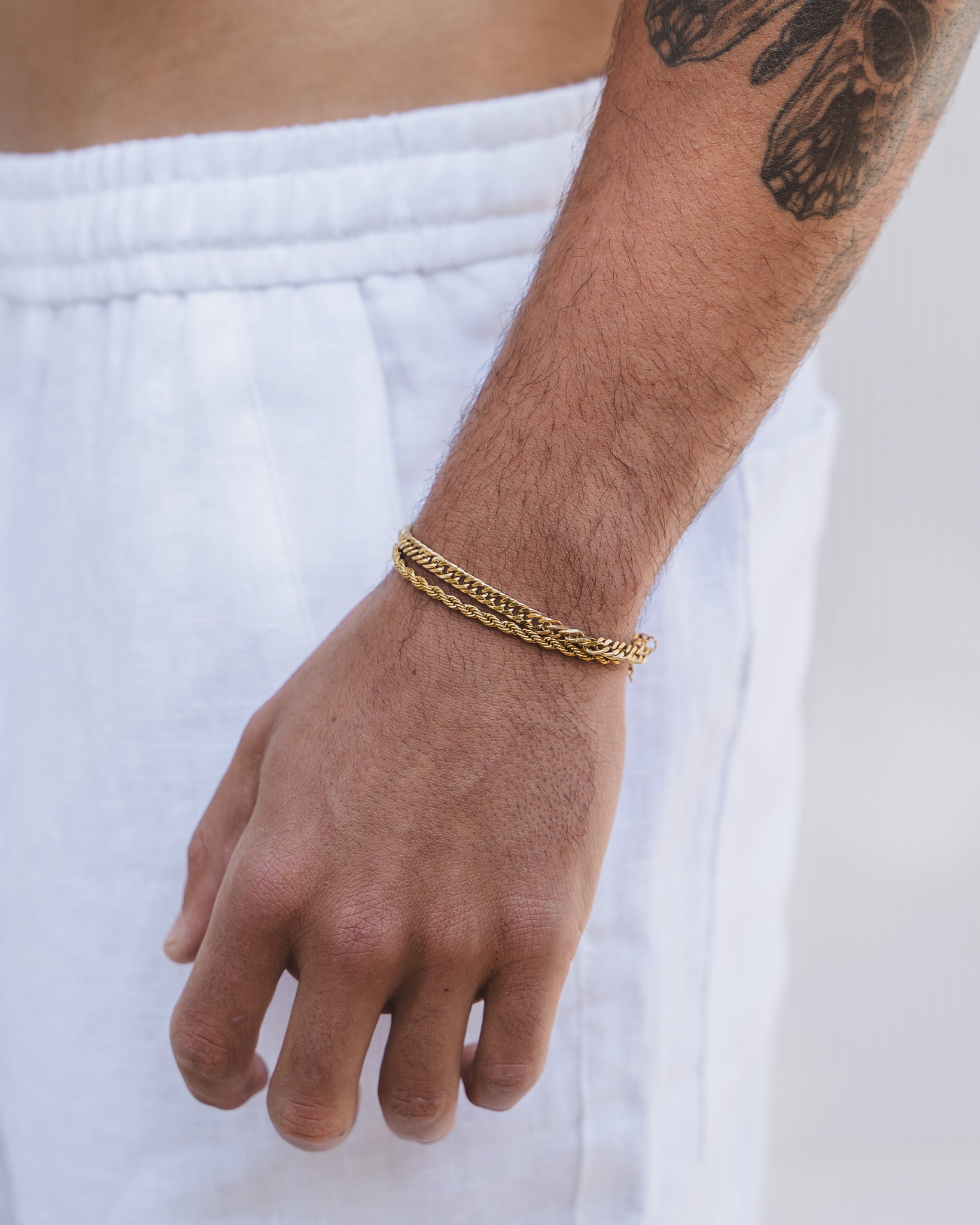 Coral Gold Bracelet on a light arm with white clothing; rope chain, adjustable 17 cm plus 3 cm