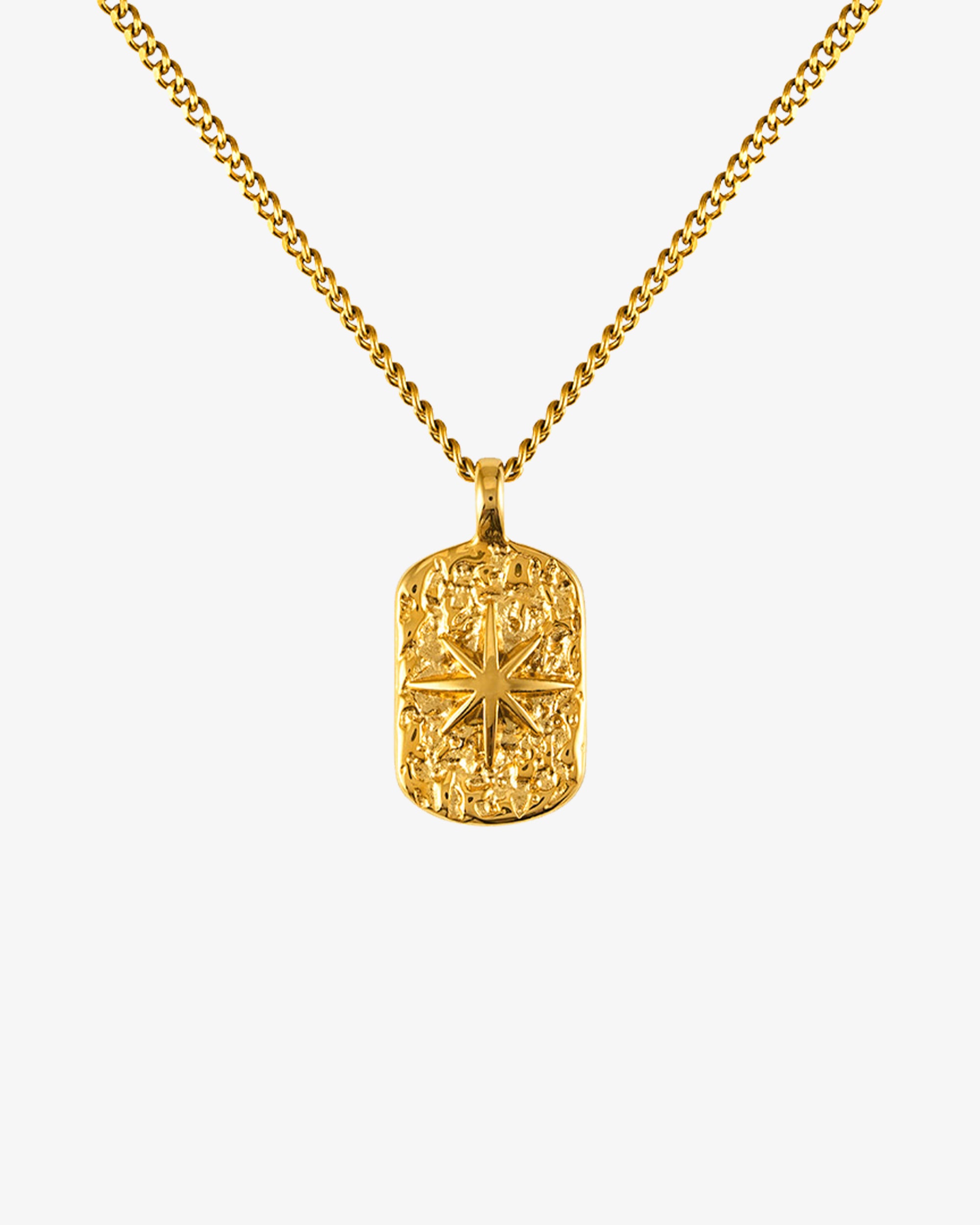 Gold IBZ necklace with a 50 cm chain plus 5 cm adjustable and a small round pendant worn by a model