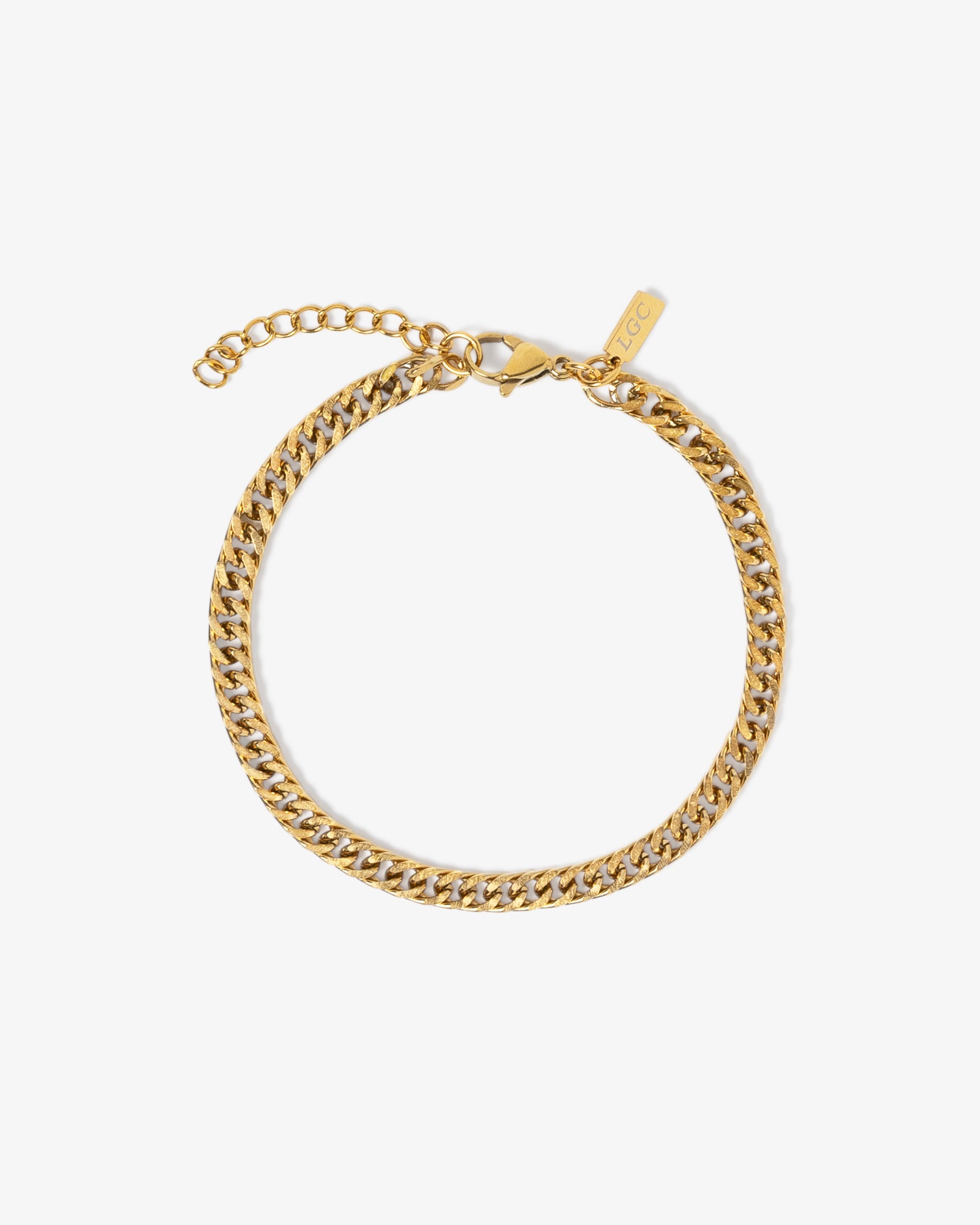 Gold coral chain bracelet with adjustable extension worn on the wrist