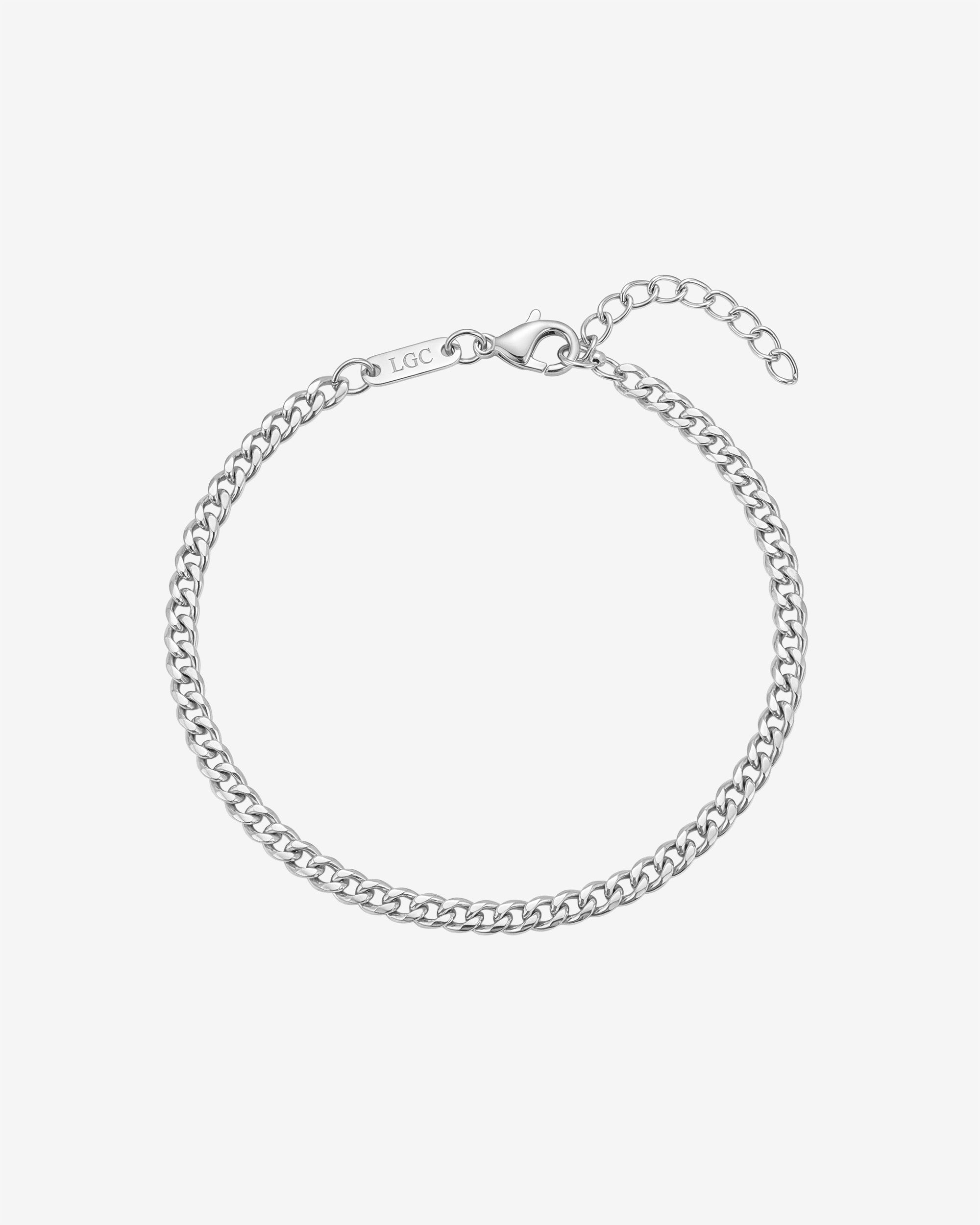 KUBU silver bracelet close-up of the Cuban link chain and lobster clasp with an LGC tag