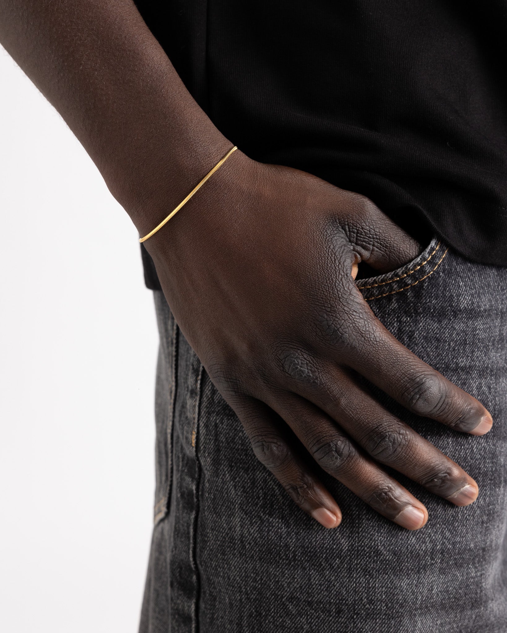 Lima Gold Bracelet worn on the wrist a slender delicate chain with an adjustable length