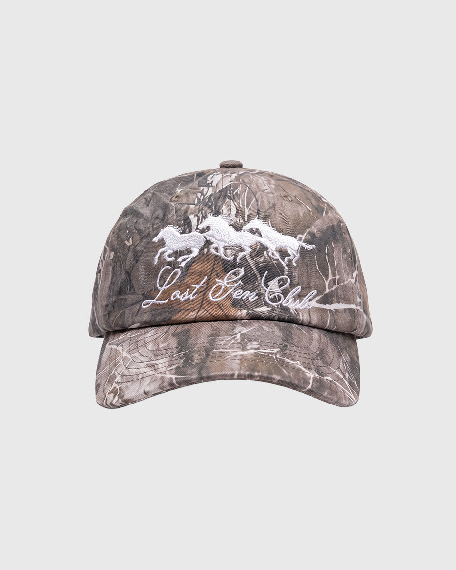 Camouflage cap with white embroidered horse logo and script on the front