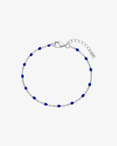 GEM silver bracelet with vivid blue beads along a silver chain and an adjustable lobster clasp