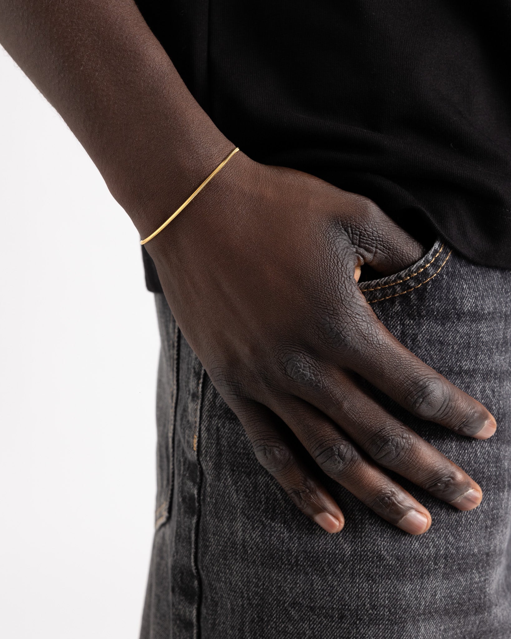 Lima Gold Bracelet worn on the wrist a slender delicate chain with an adjustable length