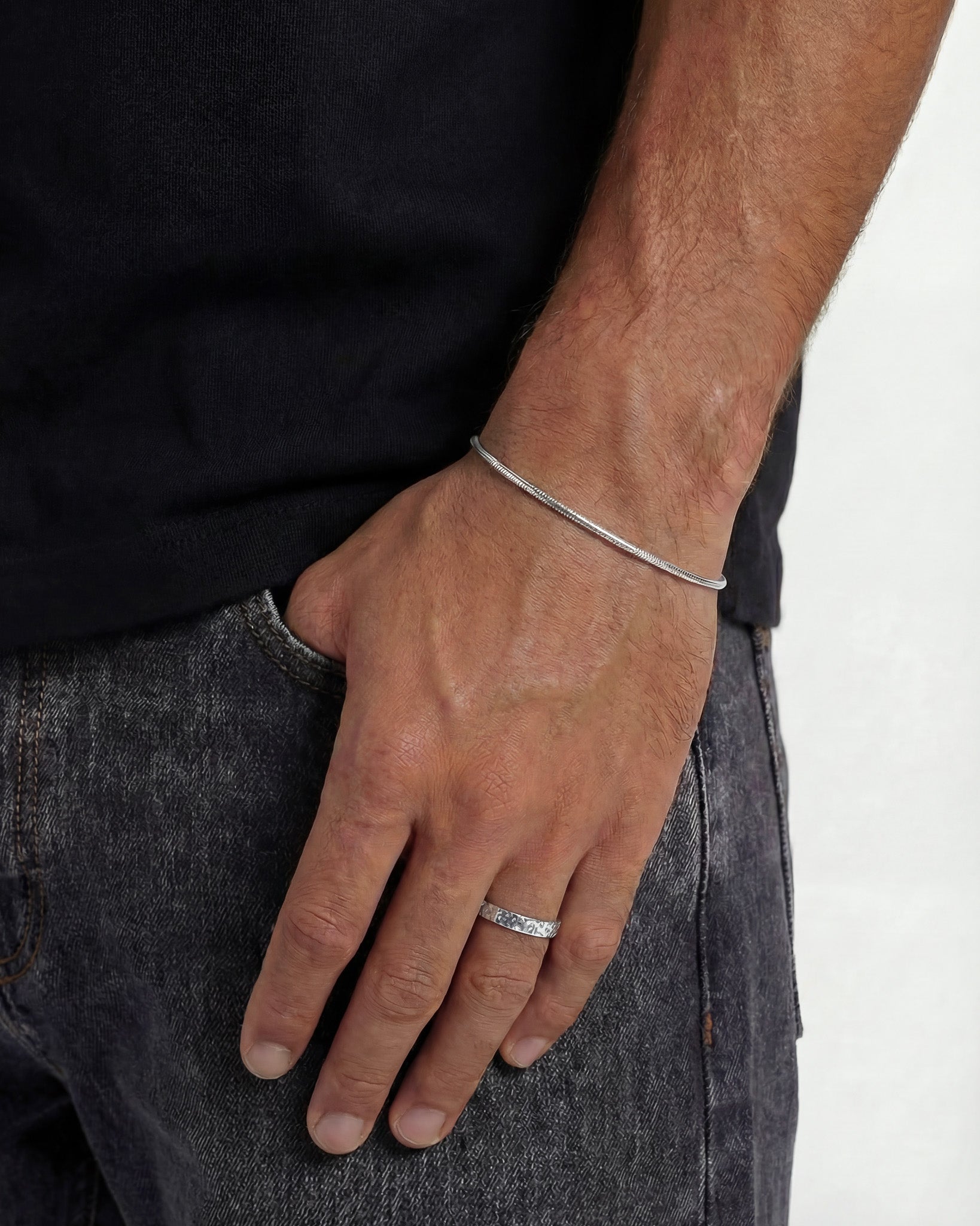 Lima silver bracelet worn on the wrist; delicate slim chain with adjustable length
